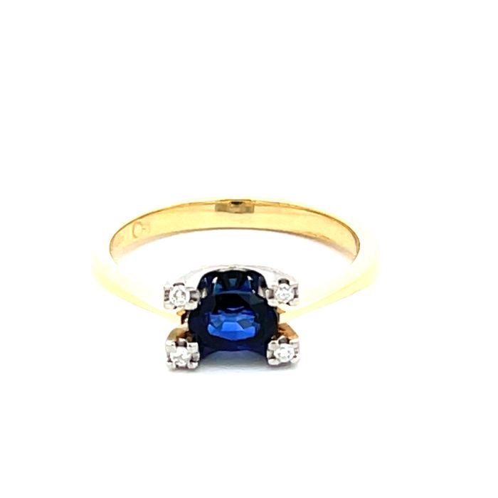 18K Yellow and White Gold 1/10ctw Diamond and 1/2ct Sapphire Ring 18K Yellow and White Gold 1/10ctw Diamond and 1/2ct Sapphire Ring